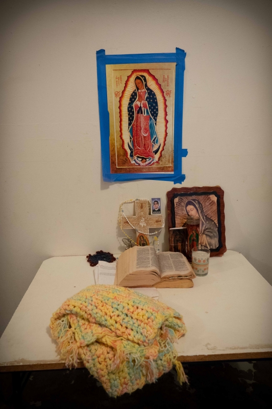 blanket, bible, and portrait of Jesus